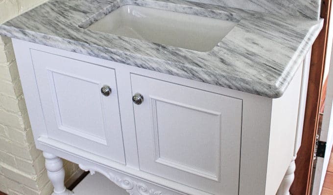 custom-white-vanity-cabinet-marble-countertop